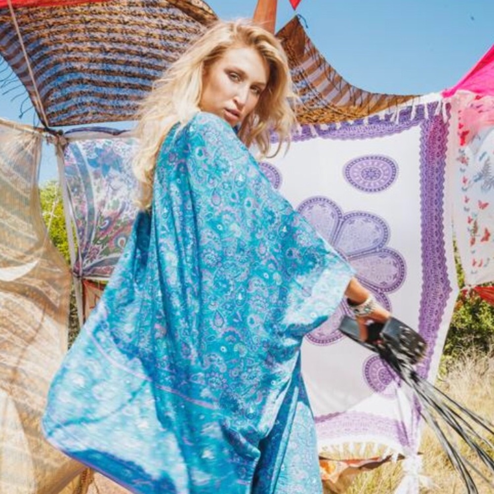 House of Skye Stevie Cape (in turquoise) OSFA